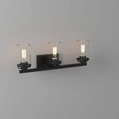 24 in. Jedrek 3-Light Black Industrial Bathroom Vanity Light with Clear Glass Shades by Designers Fountain -Designers Fountain Shop black designers fountain vanity lighting 93303 bk fa 1000