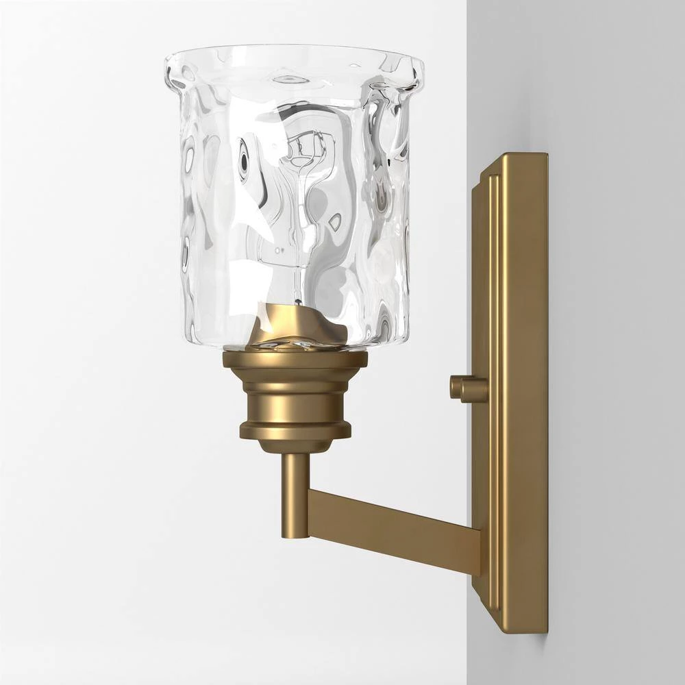 5 in. Drake 1-Light Brushed Gold Industrial Wall Mount Sconce Light with Clear Hammered Glass Shade by Designers Fountain 9 5 in. Drake 1-Light Brushed Gold Industrial Wall Mount Sconce Light with Clear Hammered Glass Shade by Designers Fountain - Image 7