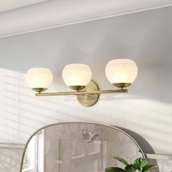 24.75 in. Moon Breeze 3-Light Brushed Gold Retro Modern Bathroom Vanity Light with Etched Glass Shades by Designers Fountain -Designers Fountain Shop brushed gold designers fountain vanity lighting d251h 3b bg 40 1000