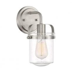 6 in. Jaxon 1-Light Brushed Nickel Industrial Wall Mount Sconce Light with Clear Seedy Glass Shade by Designers Fountain