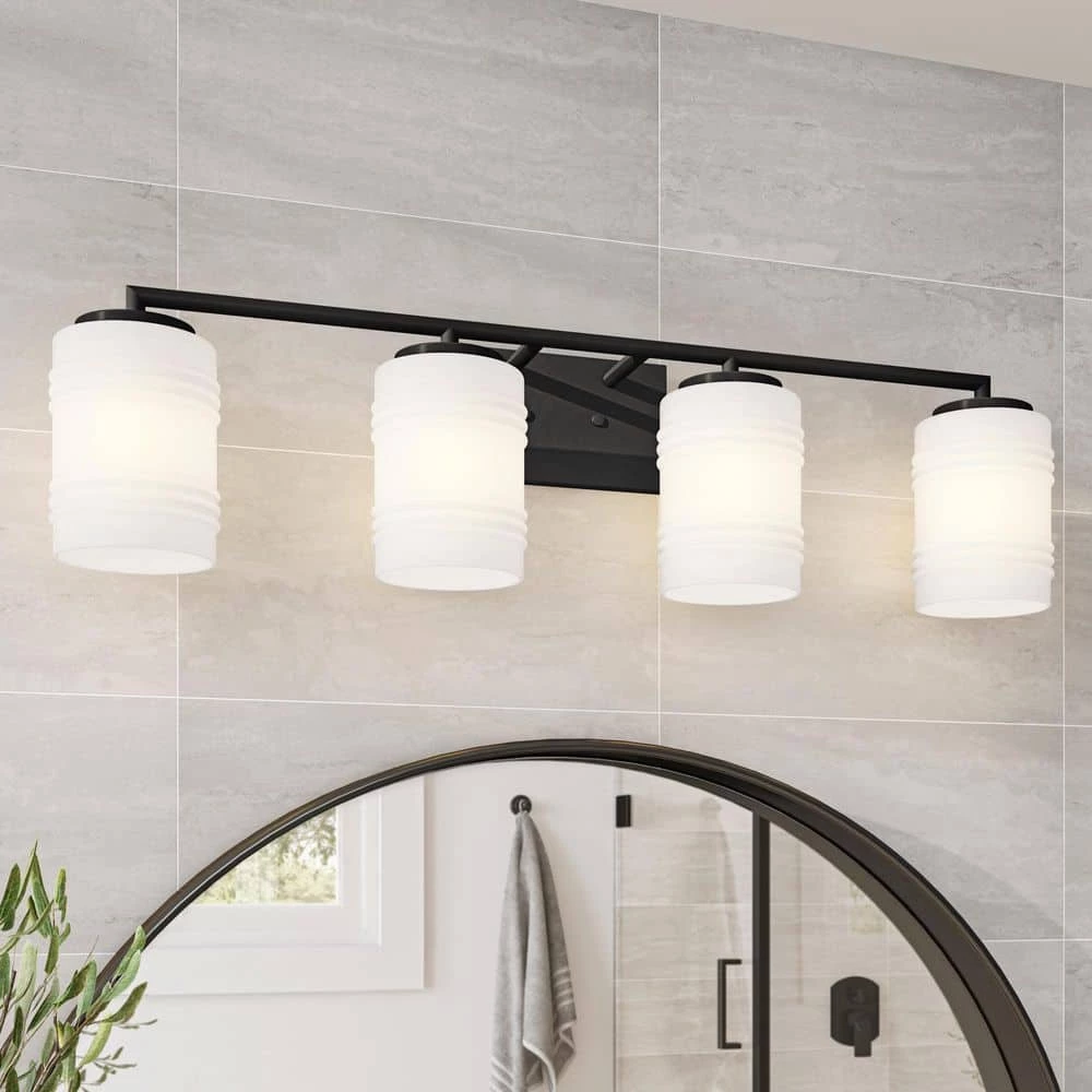33 in. Leavenworth 4-Light Matte Black Modern Bathroom Vanity Light with Etched Glass Shades by Designers Fountain 4 33 in. Leavenworth 4-Light Matte Black Modern Bathroom Vanity Light with Etched Glass Shades by Designers Fountain - Image 2