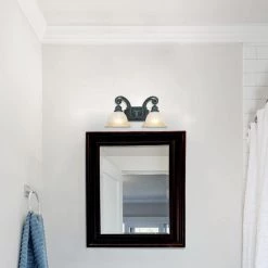 17.25 in. Barcelona 2-Light Natural Iron Spanish Style Bathroom Vanity Light with Ochre Glass Shades by Designers Fountain -Designers Fountain Shop natural iron designers fountain vanity lighting 96102 ni 40 1000