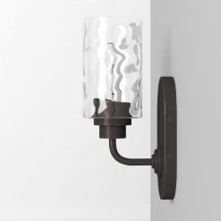 4.75 in. Gramercy Park 1-Light Old English Bronze Rustic Wall Mount Sconce Light with Clear Hammered Glass Shade by Designers Fountain -Designers Fountain Shop old english bronze designers fountain vanity lighting 87101 oeb 44 1000