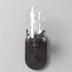 4.75 in. Gramercy Park 1-Light Old English Bronze Rustic Wall Mount Sconce Light with Clear Hammered Glass Shade by Designers Fountain -Designers Fountain Shop old english bronze designers fountain vanity lighting 87101 oeb 4f 1000