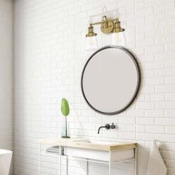 15.25 in. Taylor 2-Light Old Satin Brass Industrial Bathroom Vanity Light with Clear Glass Shades by Designers Fountain -Designers Fountain Shop old satin brass designers fountain vanity lighting 69502 osb 4f 1000