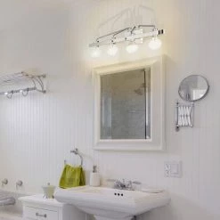 33.25 in. Ravella 4-Light Polished Nickel Modern Industrial Bathroom Vanity Light by Designers Fountain -Designers Fountain Shop polished nickel designers fountain vanity lighting 94204 pn 1f 1000