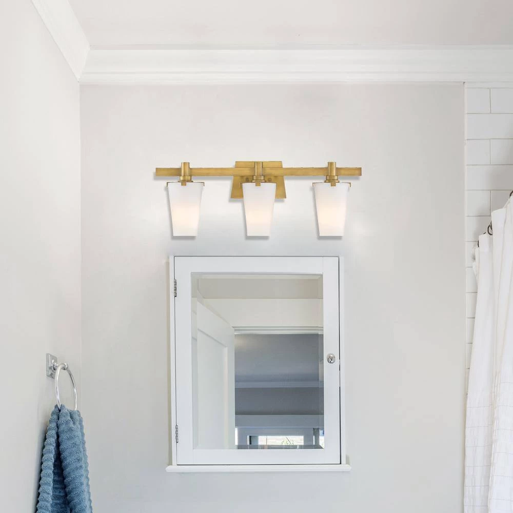 24 in. Hyde Park 3-Light Vintage Gold Modern Bathroom Vanity Light with Opal Glass Shades by Designers Fountain 8 24 in. Hyde Park 3-Light Vintage Gold Modern Bathroom Vanity Light with Opal Glass Shades by Designers Fountain - Image 6