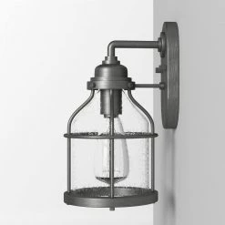 Brensten 11.75 in. Weathered Iron 1-Light Outdoor Wall Lamp with Clear Seedy Glass Shade by Designers Fountain -Designers Fountain Shop weathered iron designers fountain outdoor sconces 23121 wi 4f 1000